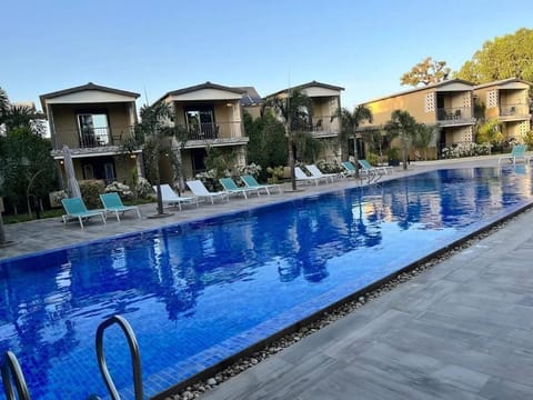 Outdoor pool, open 8:30 AM to 6:00 PM, free cabanas, pool umbrellas