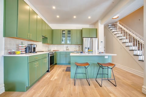 Spacious kitchen with all the comforts of home, fully stocked with pans, glassware, spices, coffee station, as well as additional amenities. 