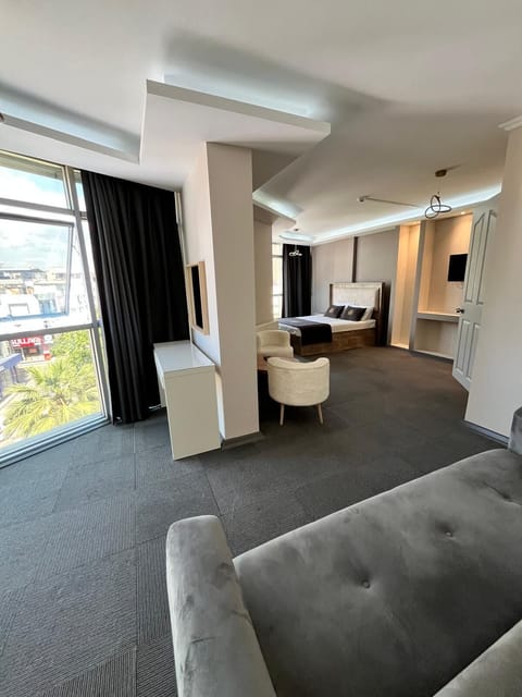 Family Quadruple Room, City View | Desk, laptop workspace, free WiFi