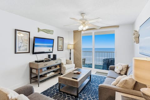 Wake up to endless ocean views from your comfortable living space, where the gentle sea breeze flows through your private balcony doors.