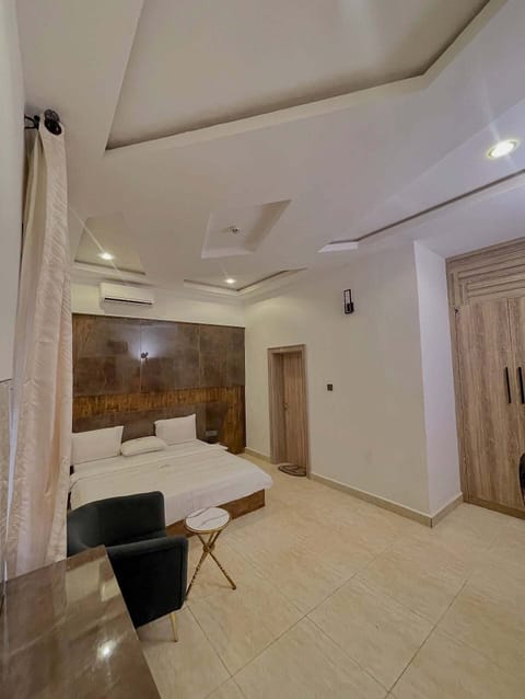 Economy Room, Balcony, City View | In-room safe, desk, laptop workspace, blackout drapes