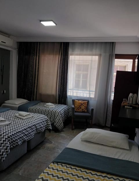 Classic Quadruple Room, City View | Free WiFi