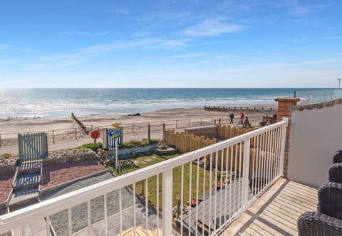 Private balcony with uninterrupted views across Cardigan Bay — the sea is right on your doorstep.
