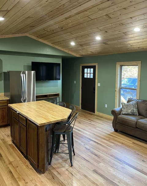 Kitchen and living area with smart tv