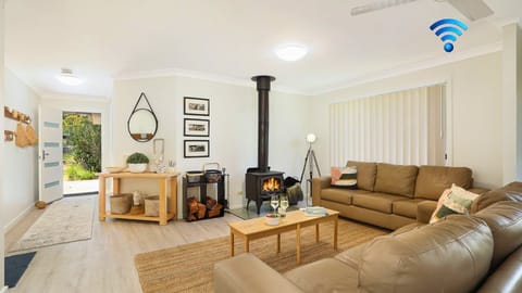 Sagewood Sands | Living room | Fireplace | Ceiling fan
