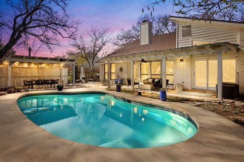 Enjoy a private pool oasis with beautiful evening lighting — the ultimate San Antonio getaway.