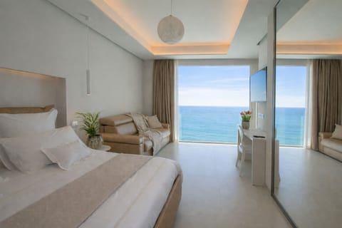 Deluxe Quadruple Room, 1 Queen Bed with Sofa bed, Non Smoking, Sea View | In-room safe, soundproofing, iron/ironing board, free WiFi