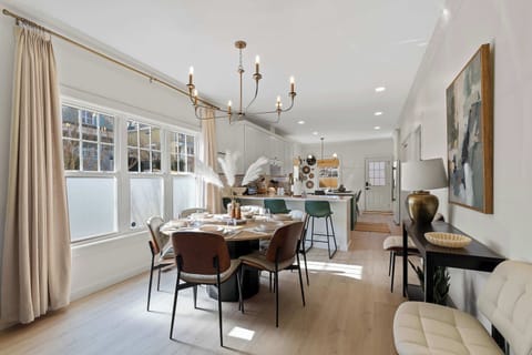 A bright, welcoming haven designed for connection. Enjoy meals, games, and long conversations around the comfortable 6-seater dining table.