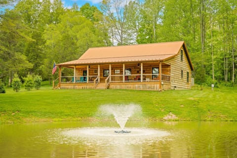 Charming cabin retreat with peaceful pond and fountain views