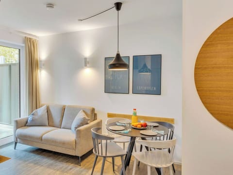 Furniture, Interior Design, Flooring, Floor, Couch, Chair, Living Room, Table, Apartment, Home