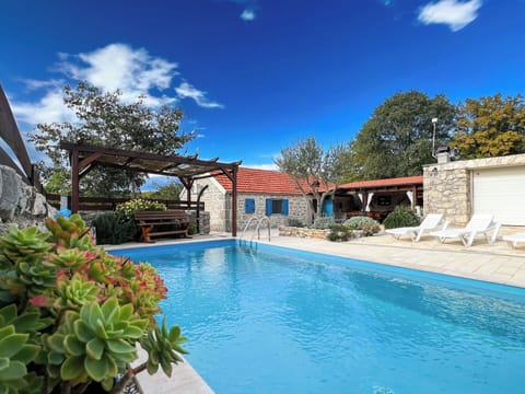 Swimming Pool, Resort, Water Feature, Eco Hotel, Flagstone, Leisure, Estate, Outdoor Furniture, Villa, Chair