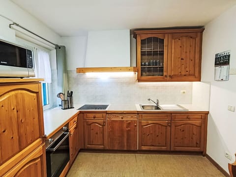 Cabinetry, Countertop, Kitchen, Furniture, Wood, Flooring, Interior Design, Kitchen Appliance, Major Appliance, Drawer