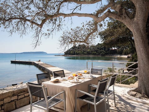 Outdoor Furniture, Coastal And Oceanic Landforms, Resort, Coast, Shore, Sea, Lake, Outdoor Table, Chair, Eco Hotel