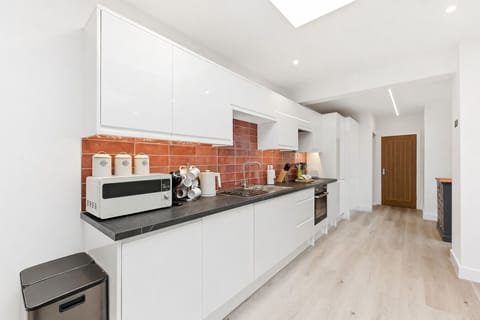 The fully equipped kitchen provides everything you need to prepare home-cooked meals.