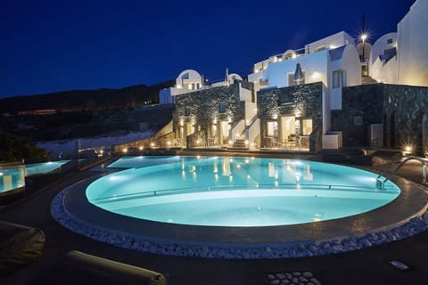 Seasonal outdoor pool, open noon to 10:00 PM, pool umbrellas