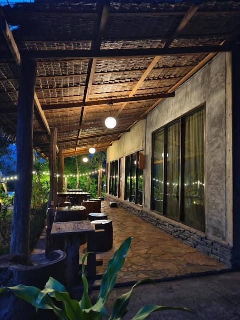 Triple Room, Garden View | Outdoor dining | Lunch and dinner served