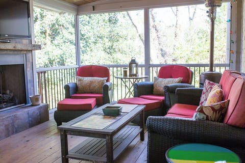 Bright and cozy living room with comfortable seating. 
