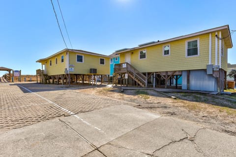 Charming coastal rental properties on stilts with convenient parking and easy beach access in a peaceful neighborhood setting.