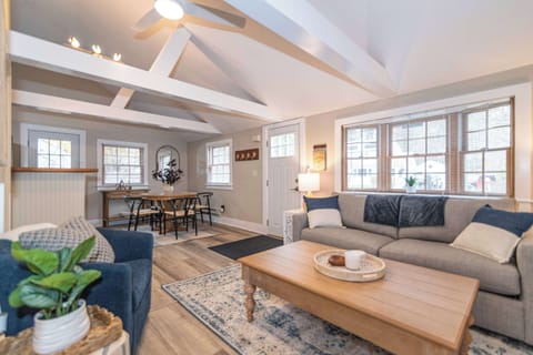 Open concept living room with a brand new sleeper sofa and Smart TV