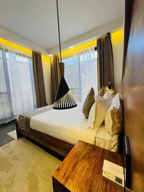 Family Apartment, Balcony, Mountain View | In-room safe, blackout drapes, iron/ironing board, free WiFi