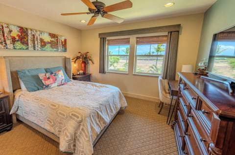 Wake up to ocean breezes in a serene, sunlit bedroom.