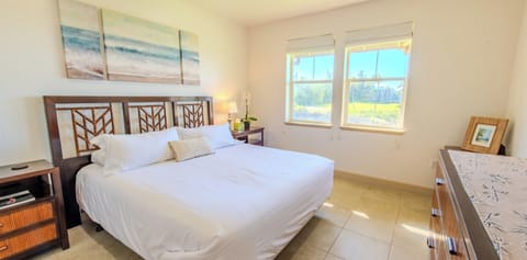 Unwind in crisp linens and wake to island sunshine.