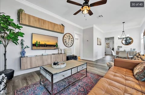 Large flatscreen tv, tv table, coffee table with storage