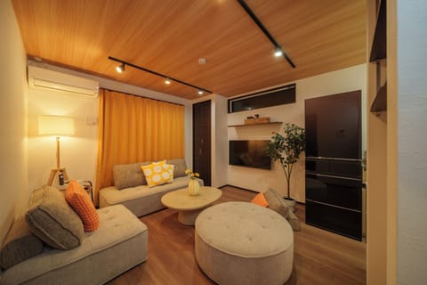 Comfort Condo, Non Smoking | Living area | Flat-screen TV