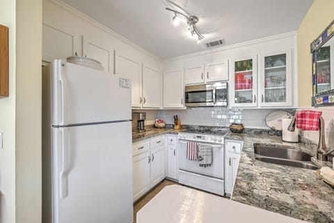 From morning coffee to gourmet dinners, this bright and functional space makes vacation cooking a breeze.