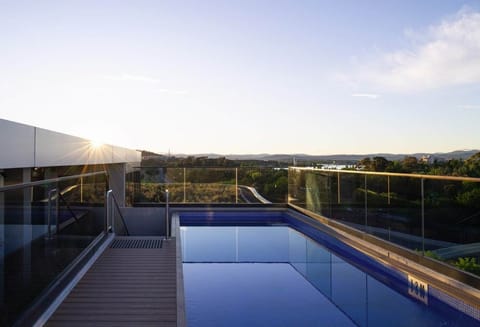 Rooftop pool within the apartment complex-located in the adjacent building but accessible to guests.
