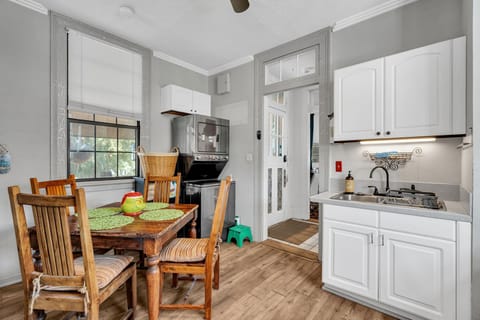 Bright, open kitchen with cozy dining nook