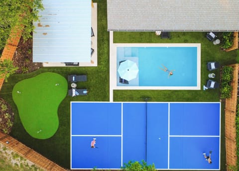Designed for both relaxing and playing, this backyard has everything you need for the perfect stay.
