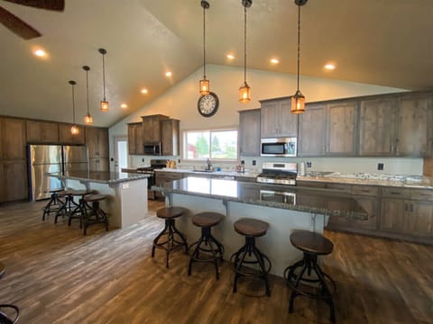 Rustic charm meets modern comfort in this spacious kitchen—perfect for cooking, gathering, and connecting.