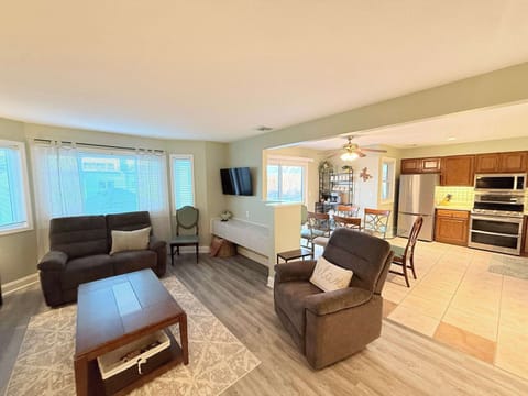 Open living, dining, and kitchen space