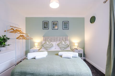 Bedroom: Relax in this chic escape with stylish decor and inviting ambiance. Perfect for unwinding!