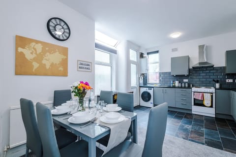 Dining Room: Enjoy meals in style with a sunlit space perfect for gatherings and good times!