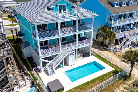Welcome to your oceanfront escape—multiple levels of outdoor living, private pool & hot tub, and the beach just steps away.
