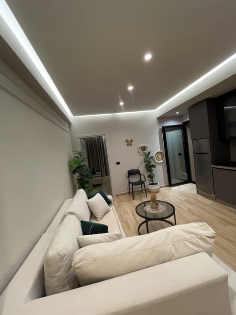 Superior Apartment, Balcony, Sea View | Living area | TV