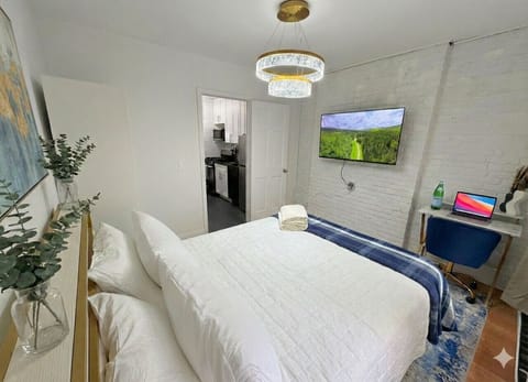 Master Bedroom with Queen bed and workspace