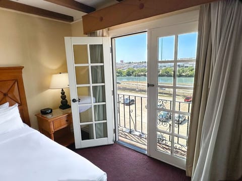 Step onto the balcony and savor open-air city views.