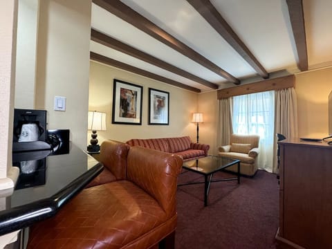 Unwind on plush seating in a bright, spacious lounge.