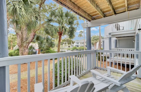 Relax on your private balcony surrounded by swaying palms, where morning coffee and gentle breezes create the perfect tropical escape.