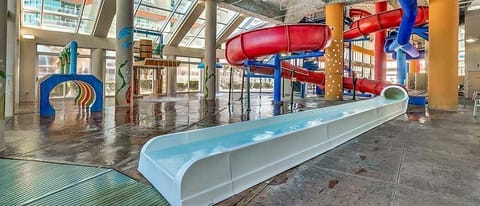Indoor waterpark with twist slides and splash zone—family fun year‑round.