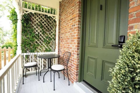 The room has its own private patio with a bistro set