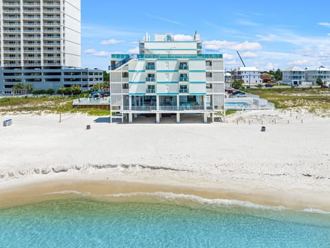 Direct beachfront location with sugar-white sand and crystal-clear water just steps away