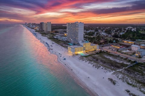 Wake up to stunning beachfront sunrises and sweeping Gulf views right from the resort