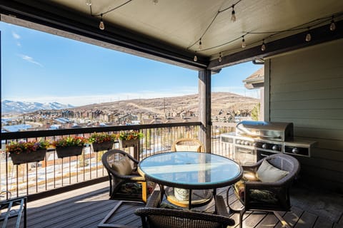 Covered deck with mountain views