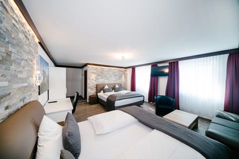 Superior Quadruple Room | In-room safe, blackout drapes, soundproofing, iron/ironing board