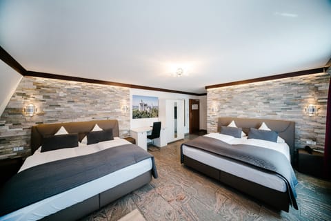 Superior Quadruple Room | In-room safe, blackout drapes, soundproofing, iron/ironing board