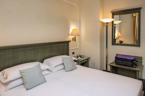 Down comforters, minibar, in-room safe, desk